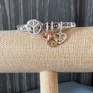 Silver-Tone Peace Sign Charm Bangle with Mixed Metal Accents